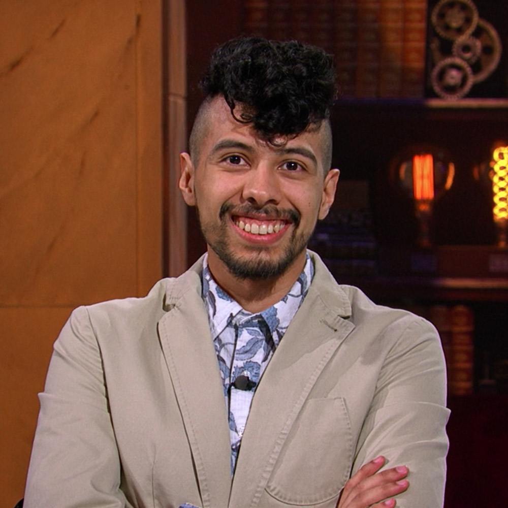 Sebastian Echeverri is on a TV studio set, smiling at the camera